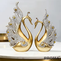 A Pair of Golden Swans Decorated with Amber Crystals